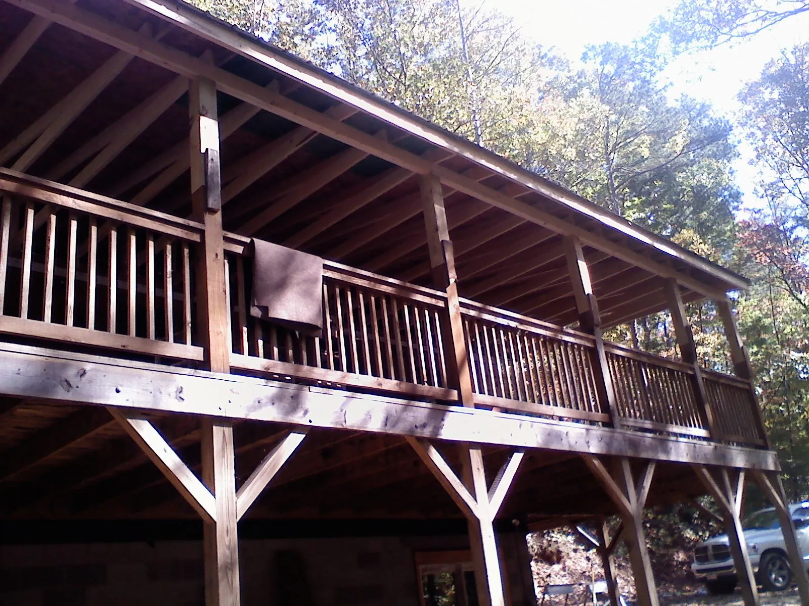 Timber framing under a new elevated porch and deck — Roof Leak Repair in Port Huron by Roofing Brothers
